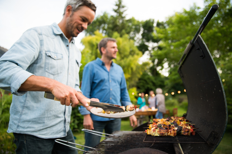 Two_men_with_a_grill