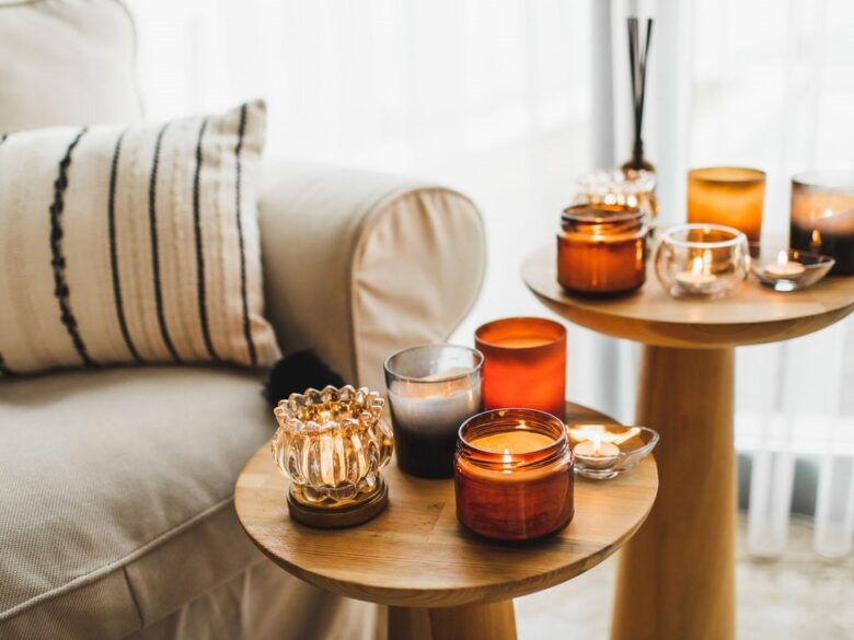 different types of candles placed in the living room