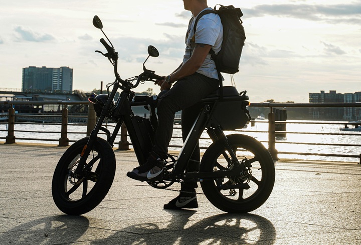 man on electric motorcycle